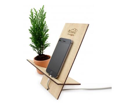support de téléphone en bois avec plante